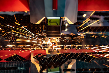 Image showing CNC Laser cutting of metal, modern industrial technology.