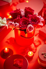 Image showing Valentines day romantic decoration with roses, boxed gifts, candles