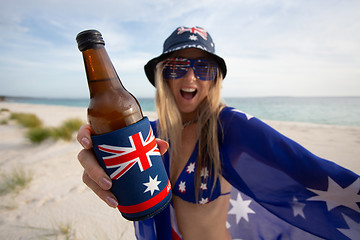 Image showing Woman celebrate Australia Day with beer