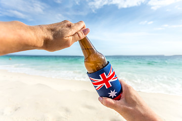 Image showing Crack open a cold beer on a summer day