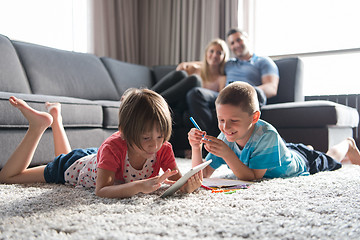 Image showing young couple spending time with kids