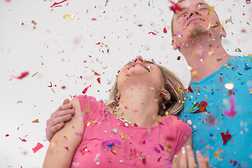 Image showing romantic young  couple celebrating  party with confetti