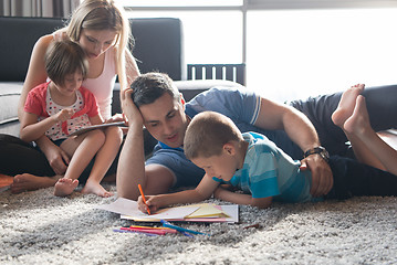 Image showing young couple spending time with kids