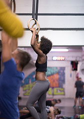 Image showing black woman doing dipping exercise