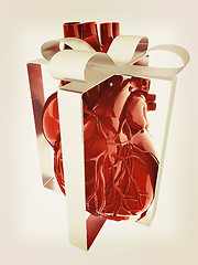 Image showing Red human heart with ribbon. Donor concept. 3d illustration. Vin