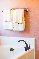 Image showing New Modern Bathtub, Faucet and Towels Hanging Abstract