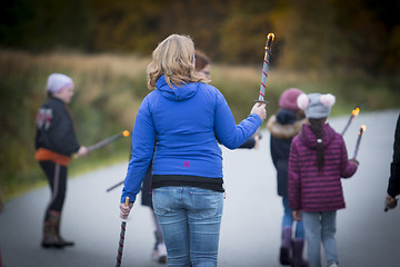 Image showing Marching with Torches