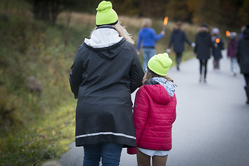 Image showing Marching with Torches