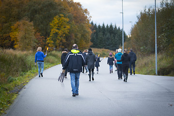 Image showing Marching with Torches