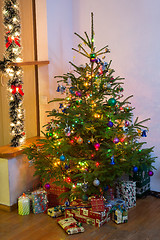 Image showing Decorated Christmas tree at home.