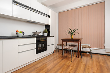 Image showing Classic black and white kitchen