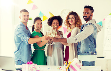 Image showing happy team with champagne at office birthday party