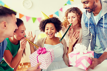 Image showing team greeting colleague at office birthday party