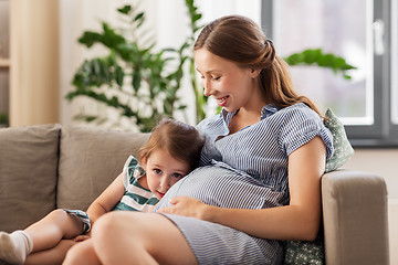 Image showing pregnant mother and daughter at home