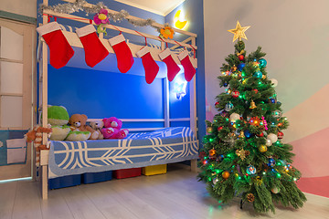 Image showing The interior of the children\'s room decorated in the New Year\'s style