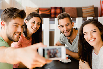 Image showing Group selfie at the coffee shop