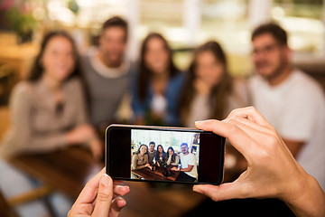 Image showing Friends taking photos 