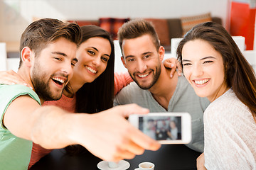 Image showing Group selfie at the coffee shop