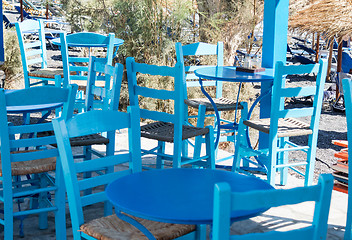 Image showing restaurant terrace in front of the beach in kamari on the island