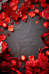 Image showing Red roses petals, candles, dating accessories, boxed gifts, hearts, sequins