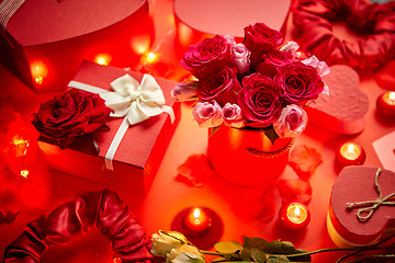 Image showing Valentines day romantic decoration with roses, boxed gifts, candles