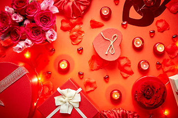 Image showing Valentines day romantic decoration with roses, boxed gifts, candles