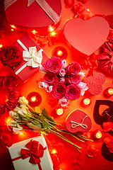 Image showing Valentines day romantic decoration with roses, boxed gifts, candles