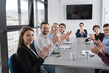 Image showing Group of young people meeting in startup office