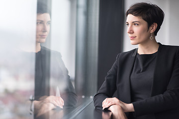 Image showing Portrait of successful Businesswoman by the window