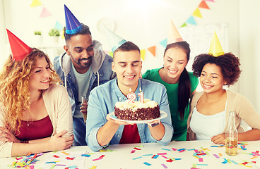 Image showing team greeting colleague at office birthday party