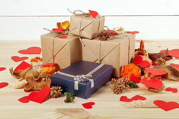 Image showing Gift boxes on wooden table