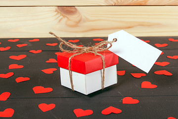 Image showing Gift boxes on wooden table