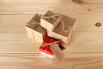 Image showing Gift boxes on wooden table