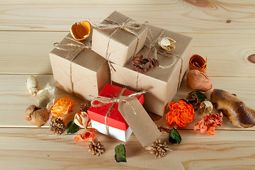 Image showing Gift boxes on wooden table