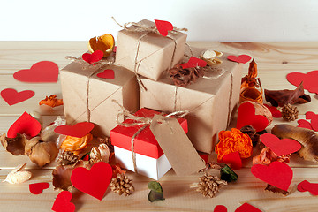 Image showing Gift boxes on wooden table