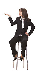 Image showing Businesswoman presenting something