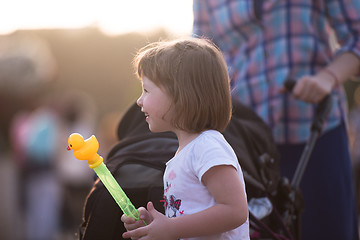 Image showing little girl with a doll