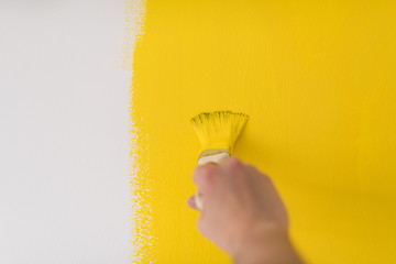 Image showing hand painting wall