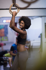 Image showing black woman doing dipping exercise