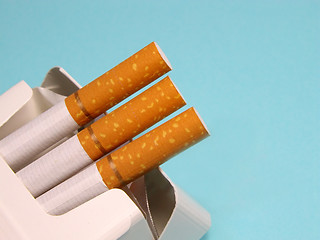 Image showing Cigarettes over blue background