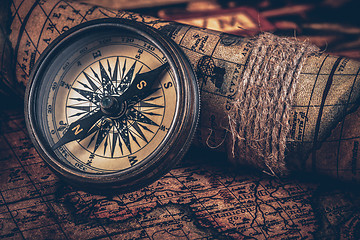 Image showing Old vintage compass on ancient map