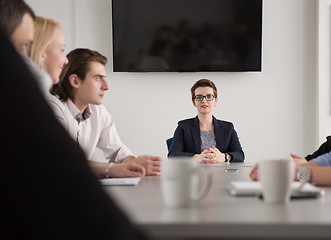 Image showing Group of young people meeting in startup office