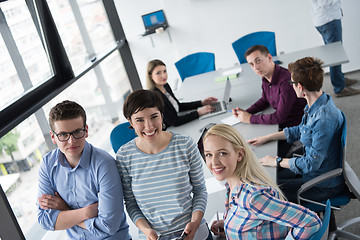 Image showing group of Business People Working With Tablet in startup office