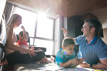 Image showing young couple spending time with kids