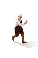 Image showing Serious butcher running with a cleaver isolated on white background