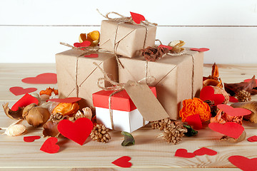 Image showing Gift boxes on wooden table