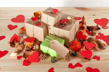 Image showing Gift boxes on wooden table