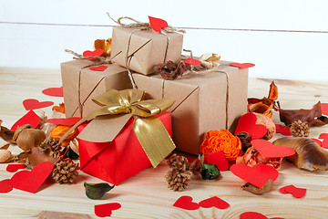 Image showing Gift boxes on wooden table