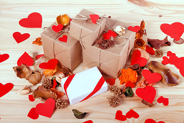 Image showing Gift boxes on wooden table