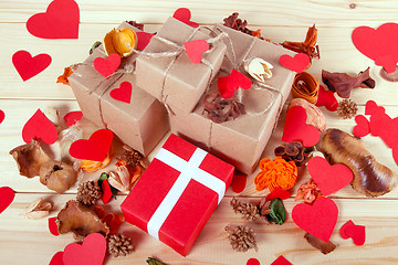 Image showing Gift boxes on wooden table